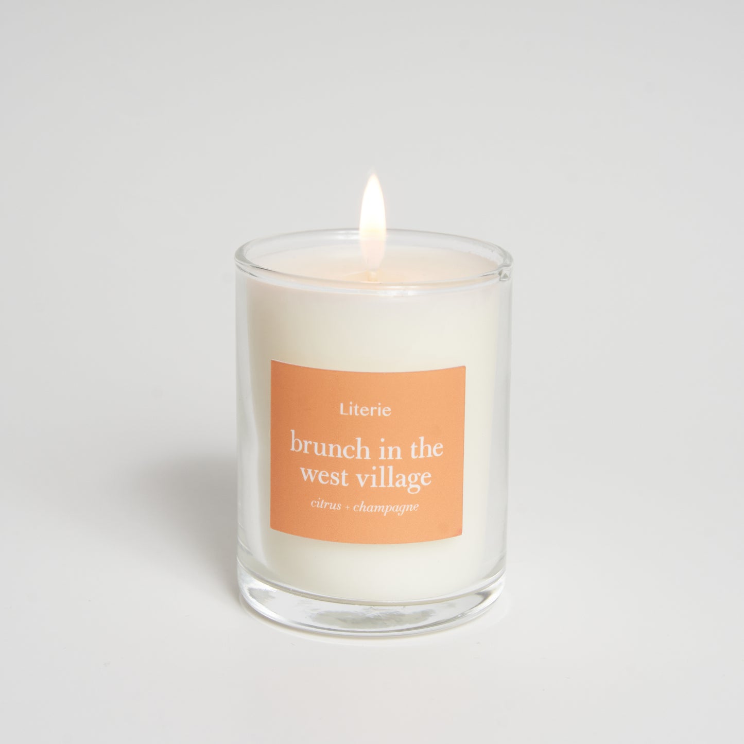 brunch in the west village little candle on a white background.