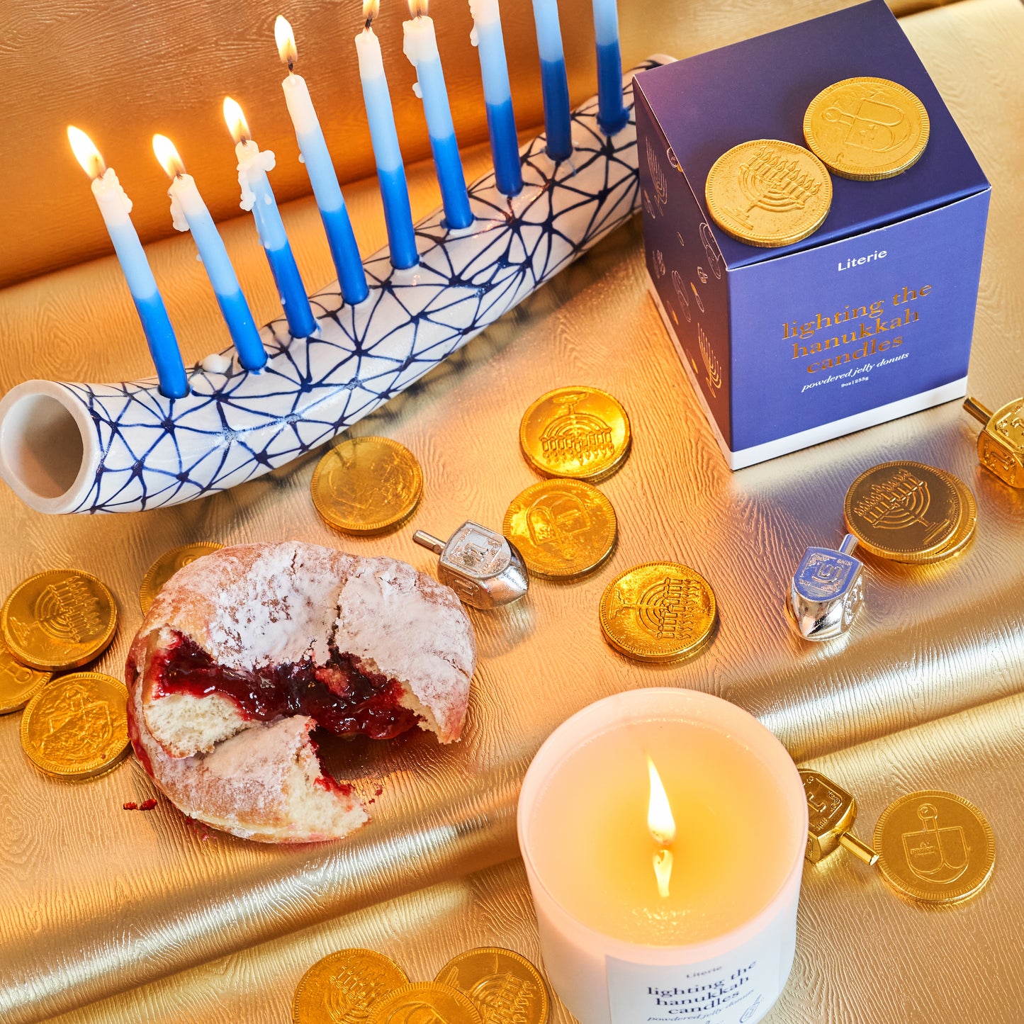 hanukkah candle with jelly donut.