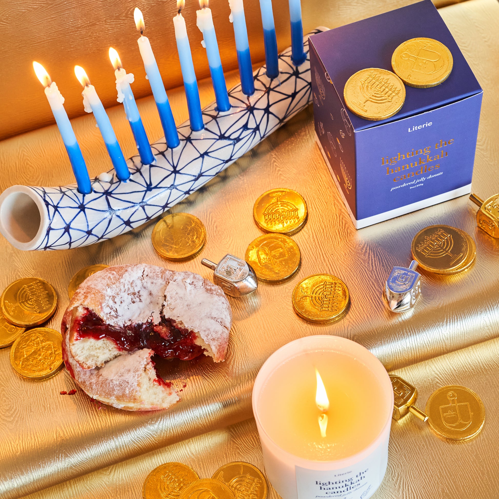 hanukkah candle with jelly donut.