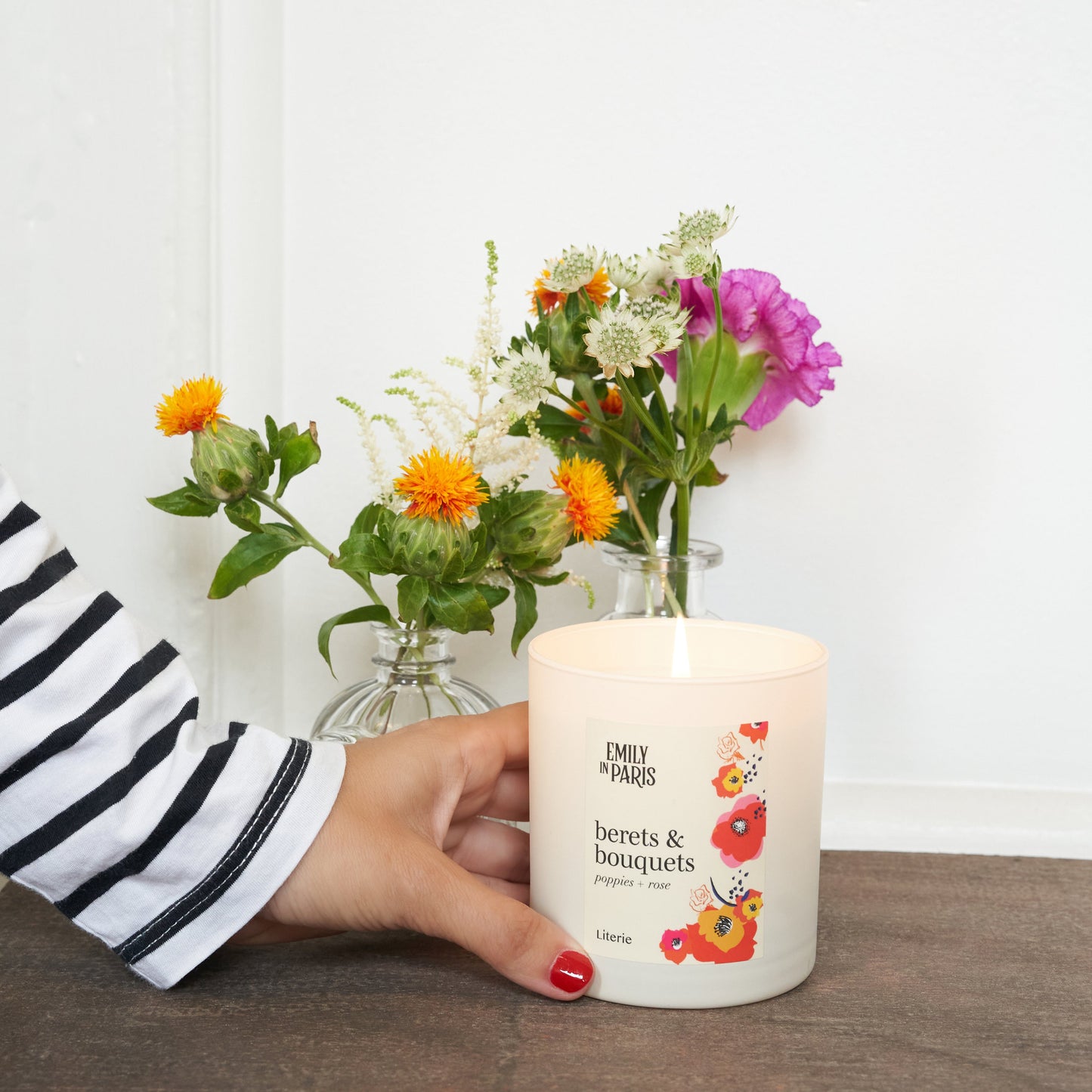 Emily In Paris berets and bouquets candle with flowers.