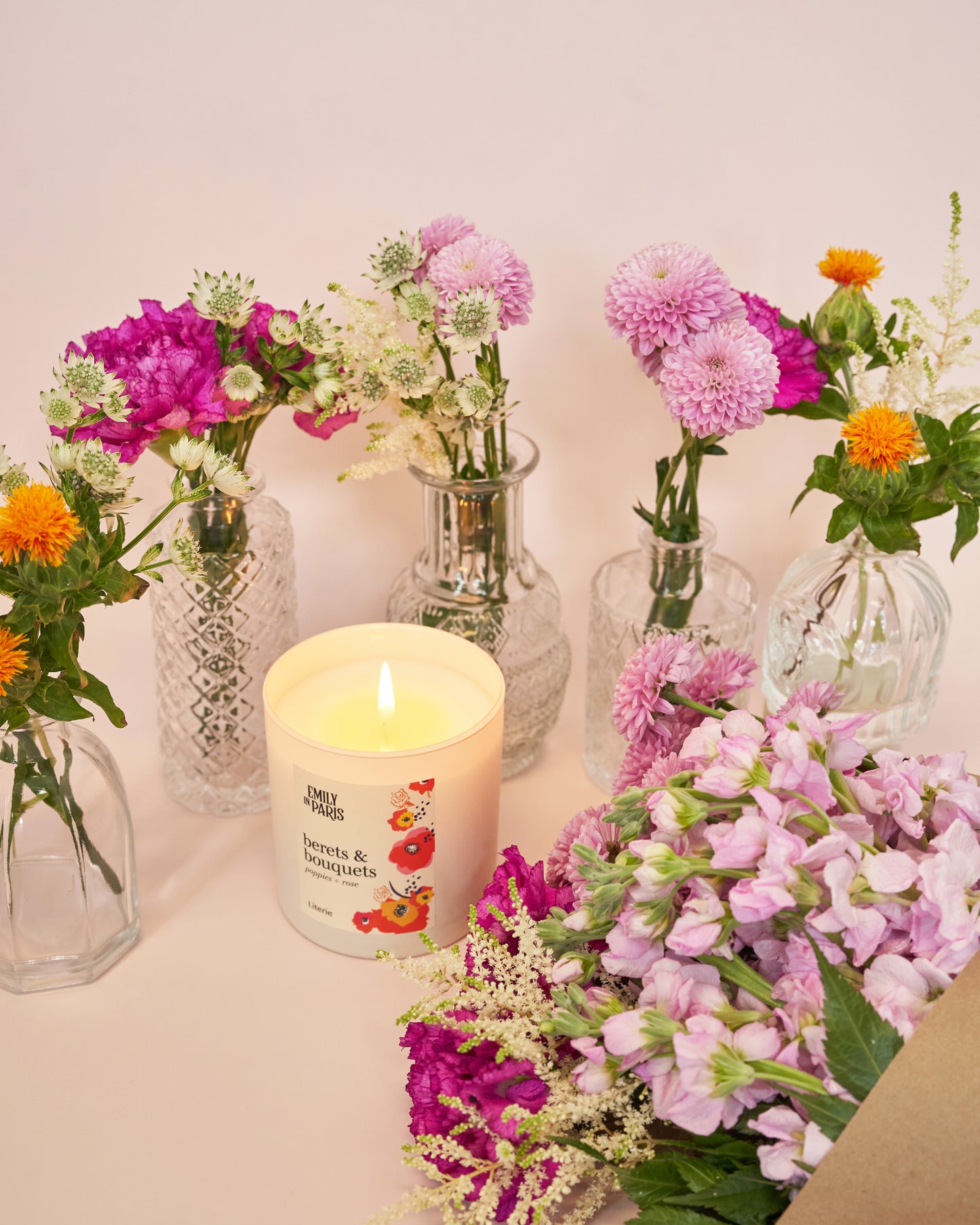 emily in paris berets and bouquets candle with flowers