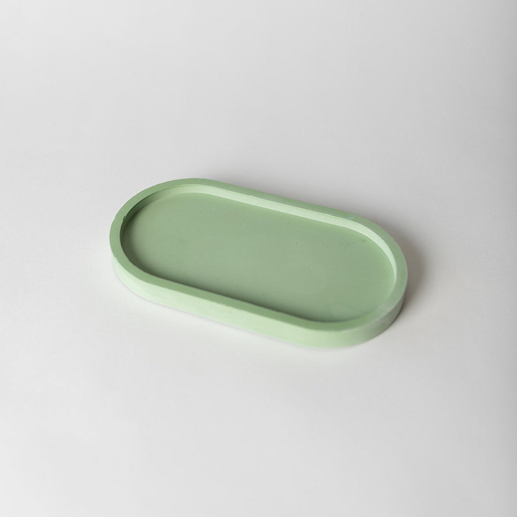 Matcha green pill shaped candle tray.