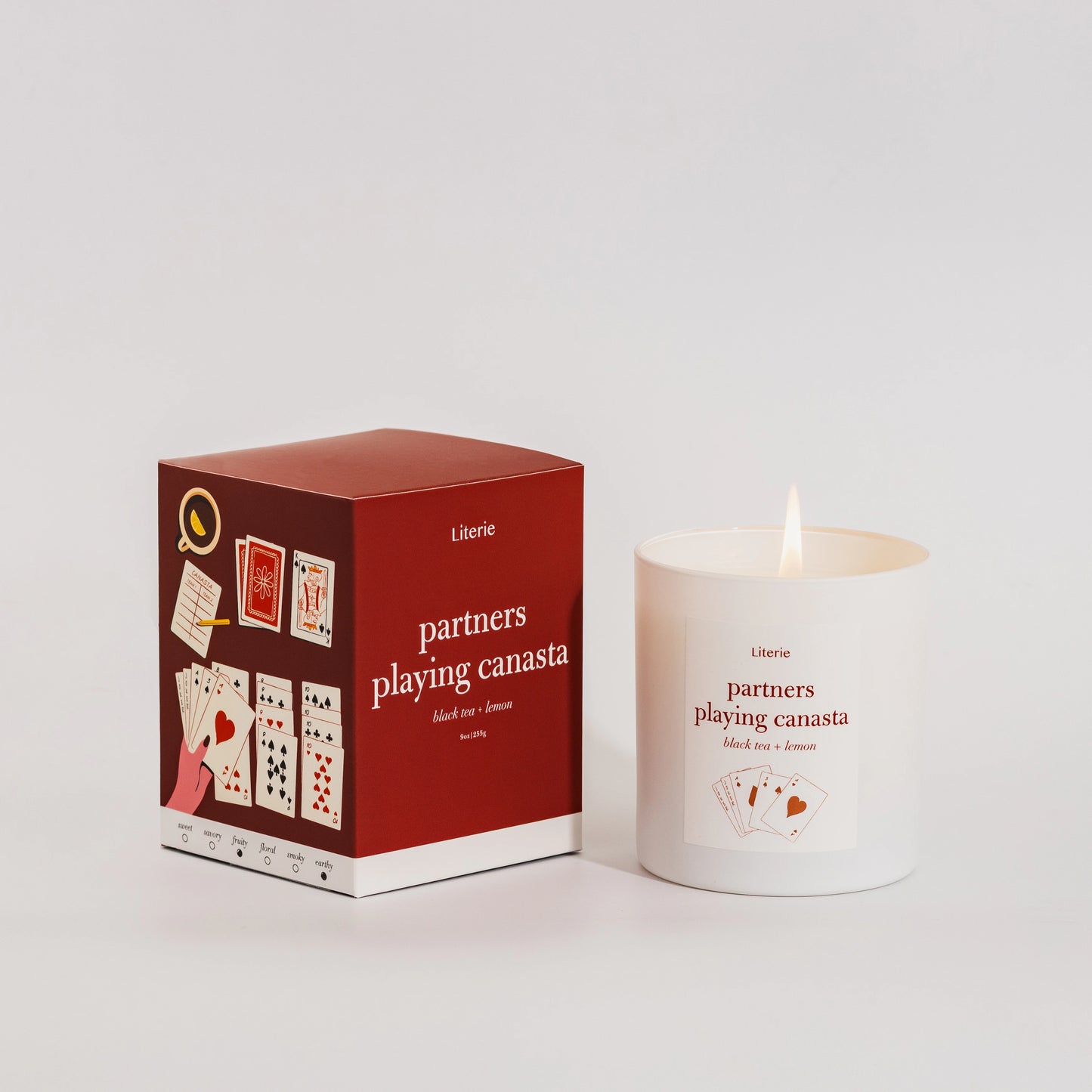 Partners playing canasta candle and box by Literie.