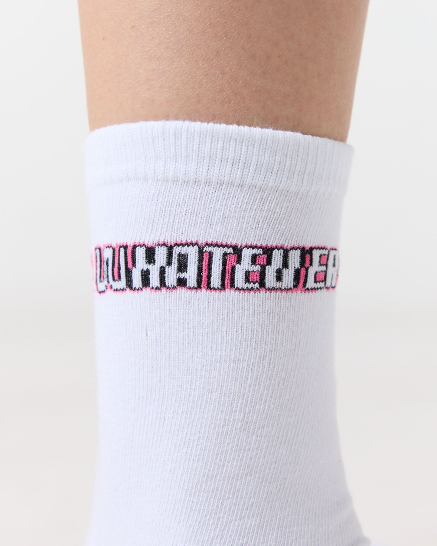 White sock with pink and black text on a white background