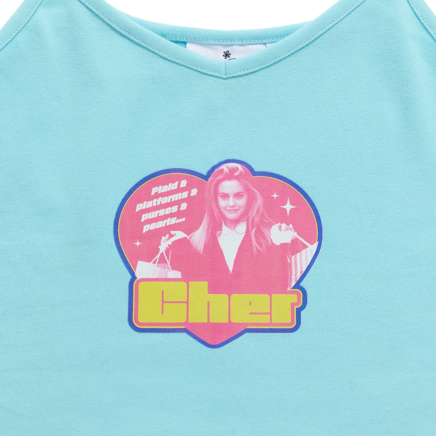 Light blue tank top with a graphic of a person in a pink heart shape and 'Cher' text on a white background.