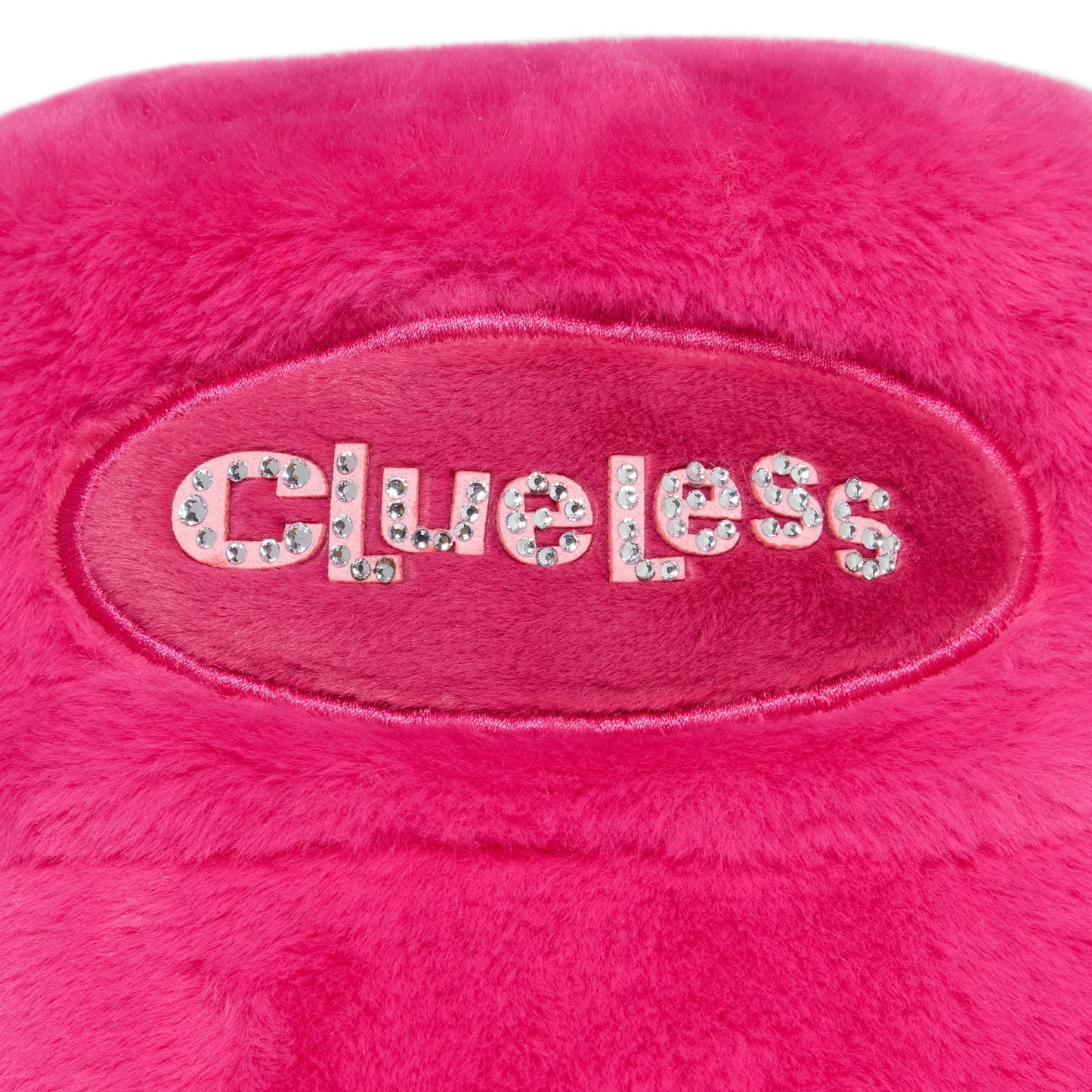 Pink plush toy with 'Clueless' text on a white background