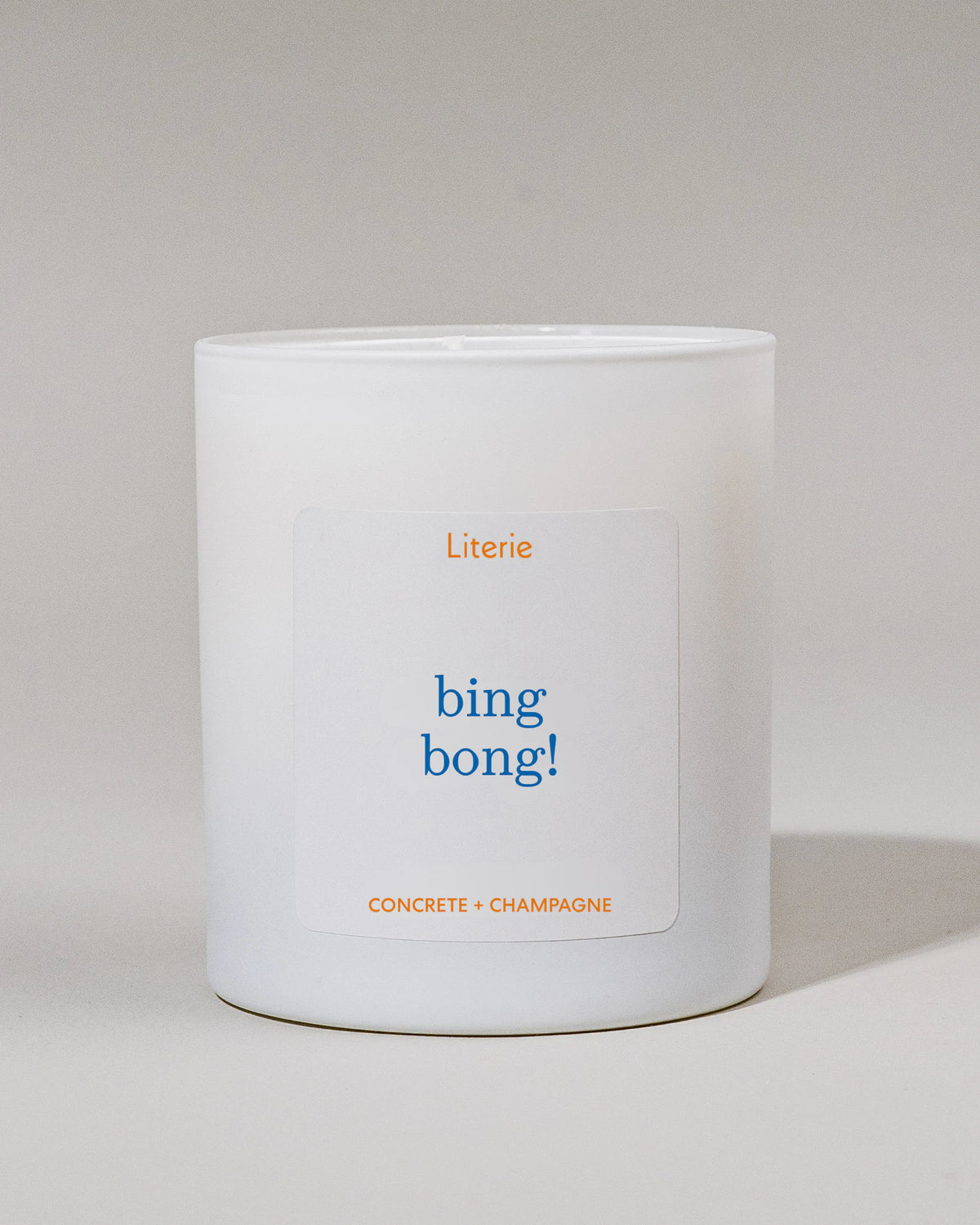 White Knicks inspired candle container with 'bing bong!' label on a light gray background