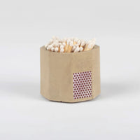 Taupe match stick holder with white matches included.