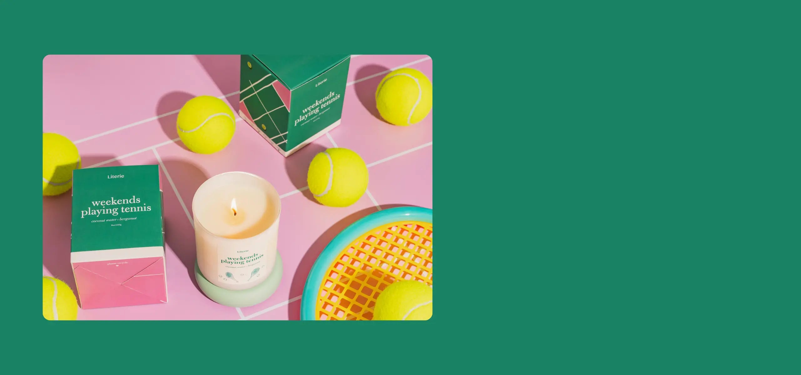 Weekends playing tennis candle with packaging and tennis balls on a pink background.