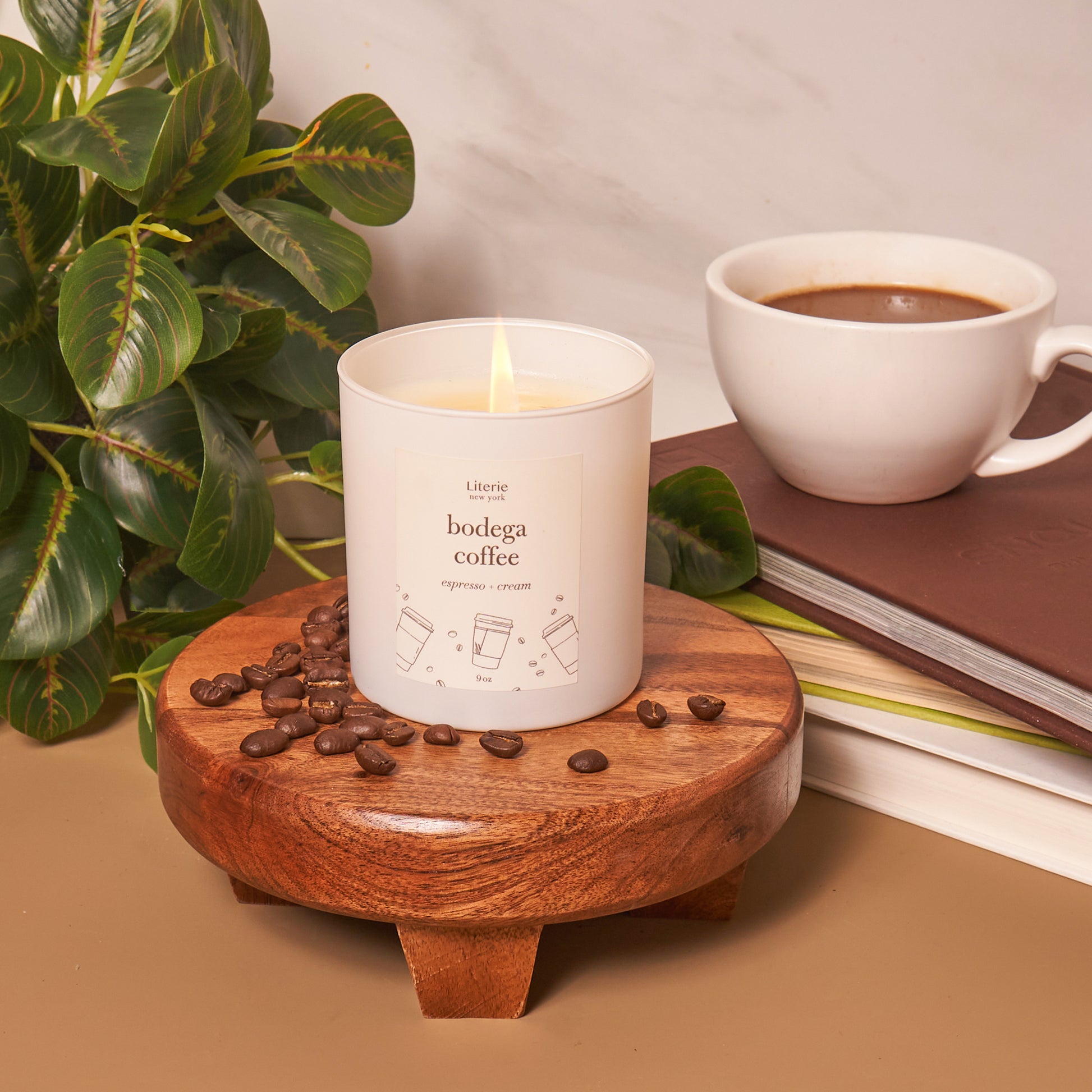 Bodega coffee candle with a cup of coffee.
