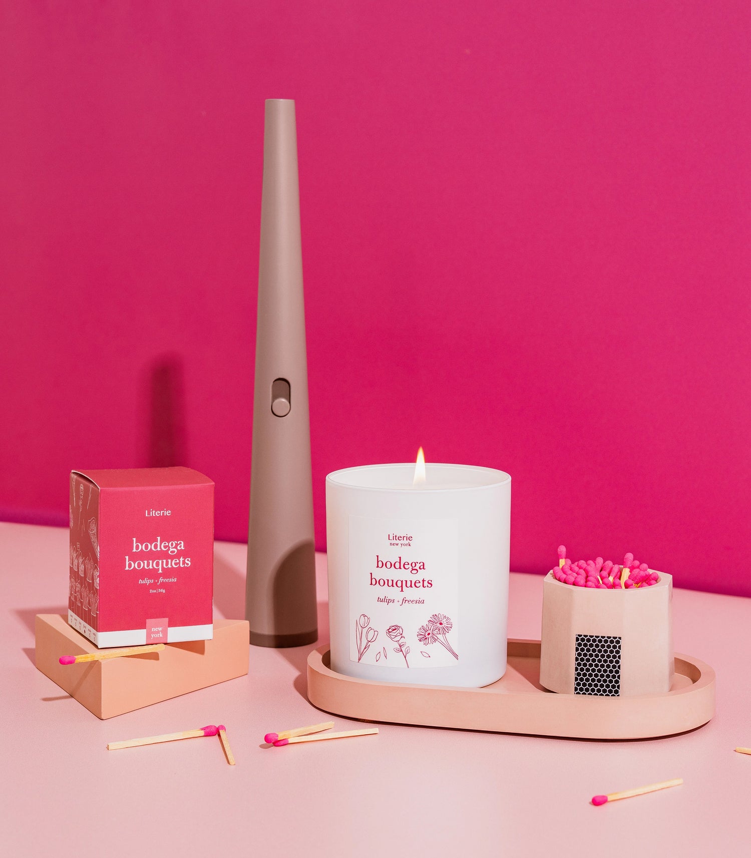 Literie candles and electric lighter by flume.