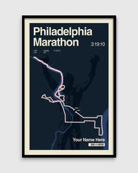 Framed poster of the Philadelphia Marathon route with a silhouette of a runner.