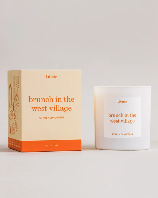Literie 'brunch in the west village' candle and packaging on a light gray background