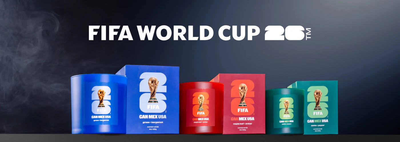 Promotional image of FIFA World Cup 2026 candles with colorful packaging on a dark background.