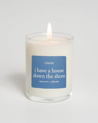 i have a house down the shore little candle in a clear jar.