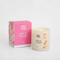 Pain au chocolat Emily in Paris candle with box.