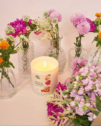 emily in paris berets and bouquets candle with flowers