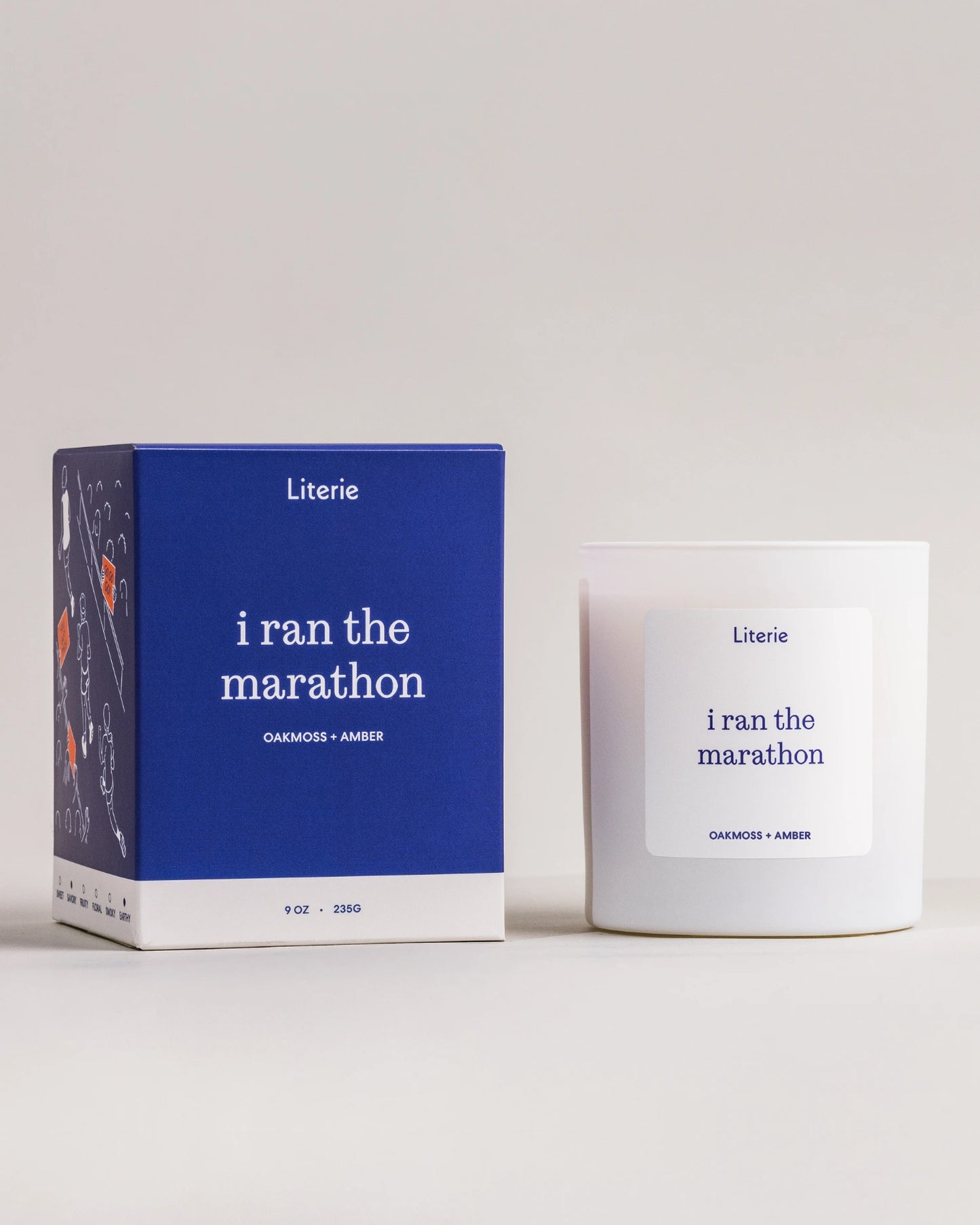 Literie candle packaging with 'i ran the marathon' text on a white background