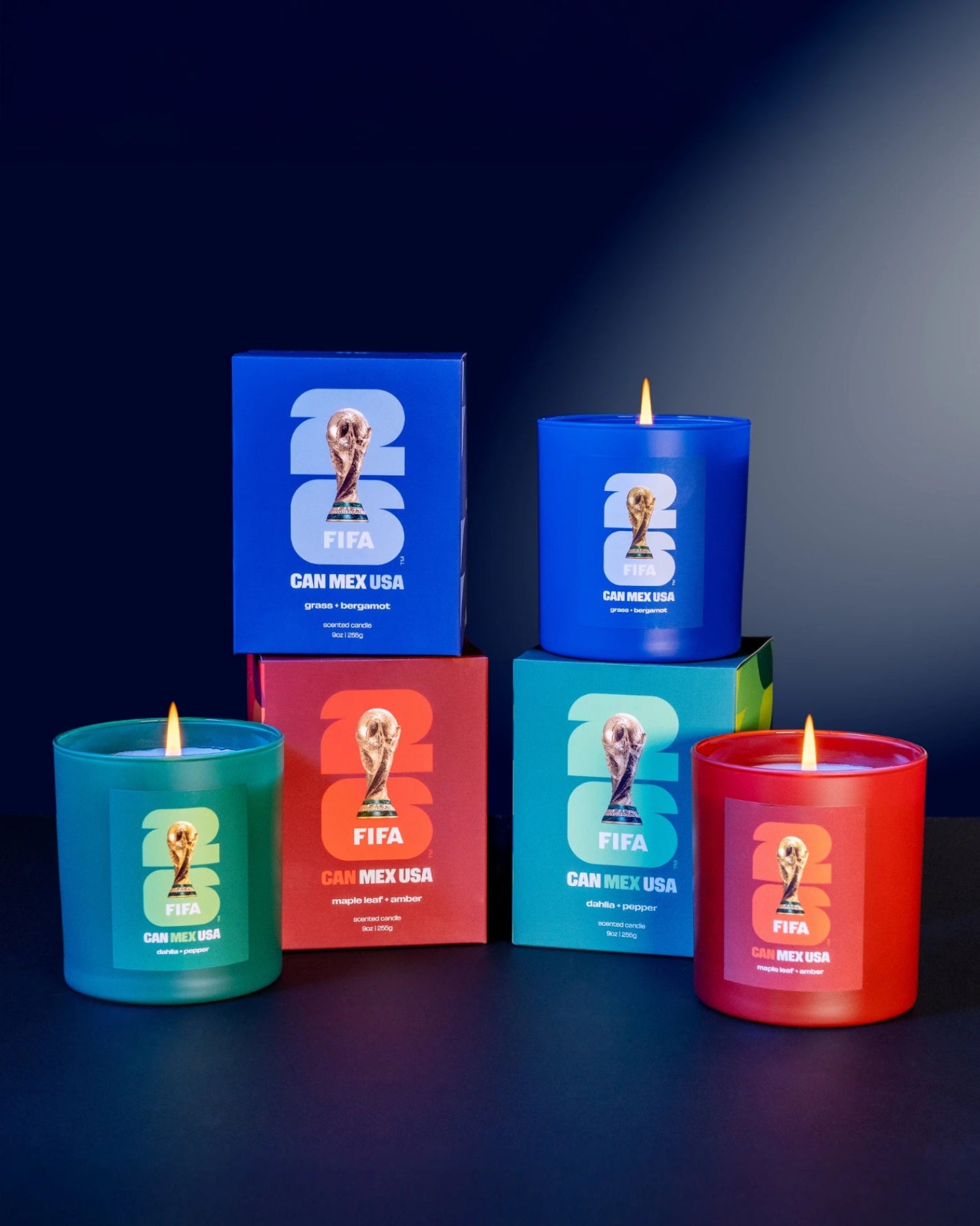 Three 2026 FIFA World Cup -themed candles and boxes on a dark background made by Literie.