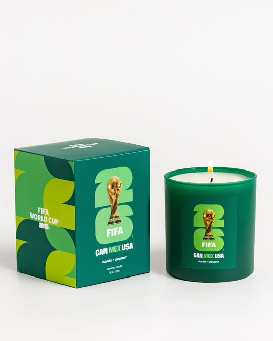 Green candle and packaging with Mexico 2026 FIFA World Cup and Literie branding on a white background