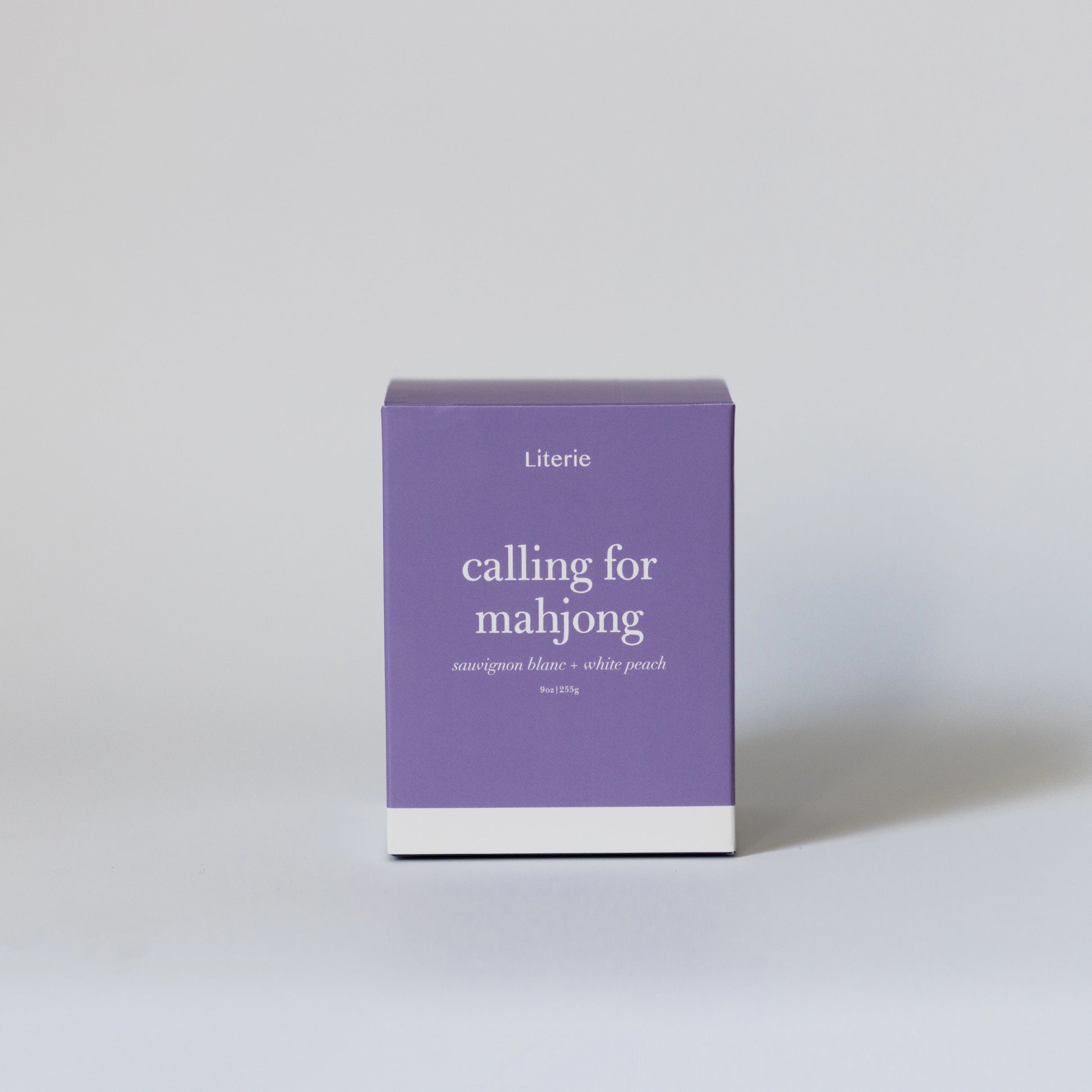 Calling for Mahjong purple candle box front.