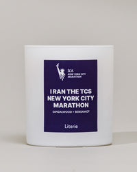 I Ran The TCS New York City Marathon candle on a white background.