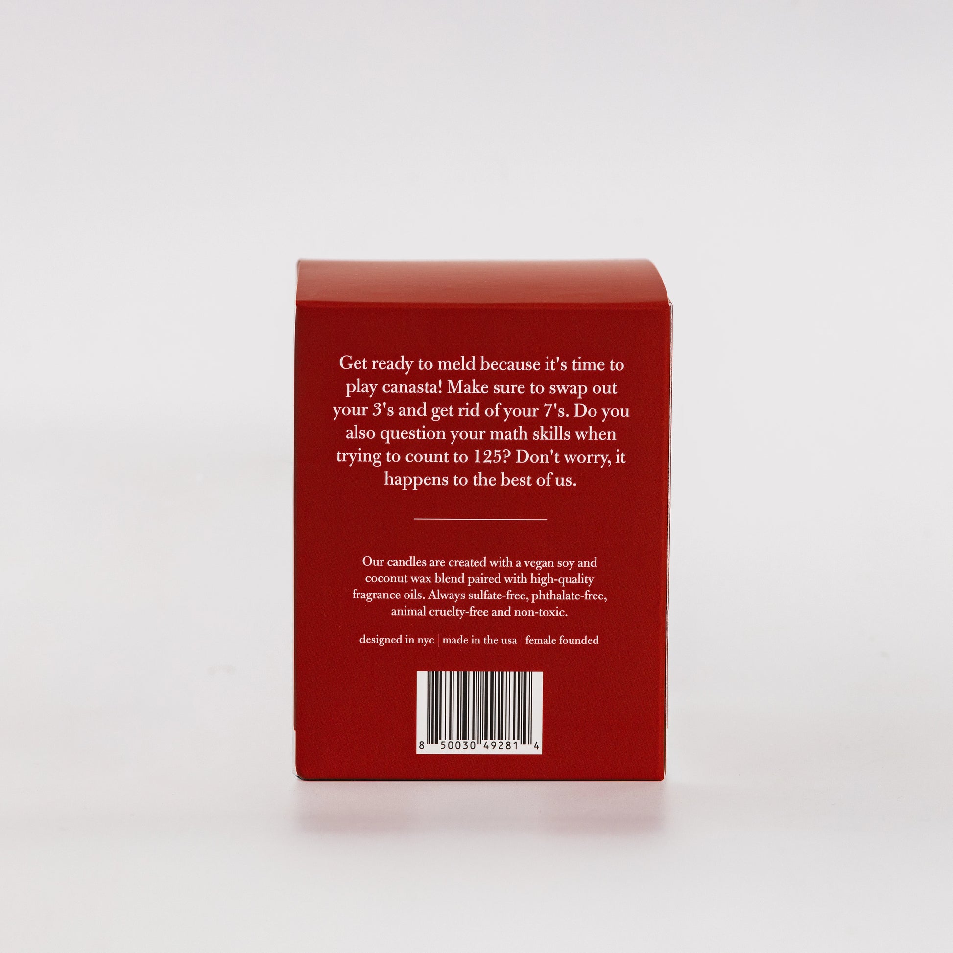 Back of the partners playing canasta box with product description.