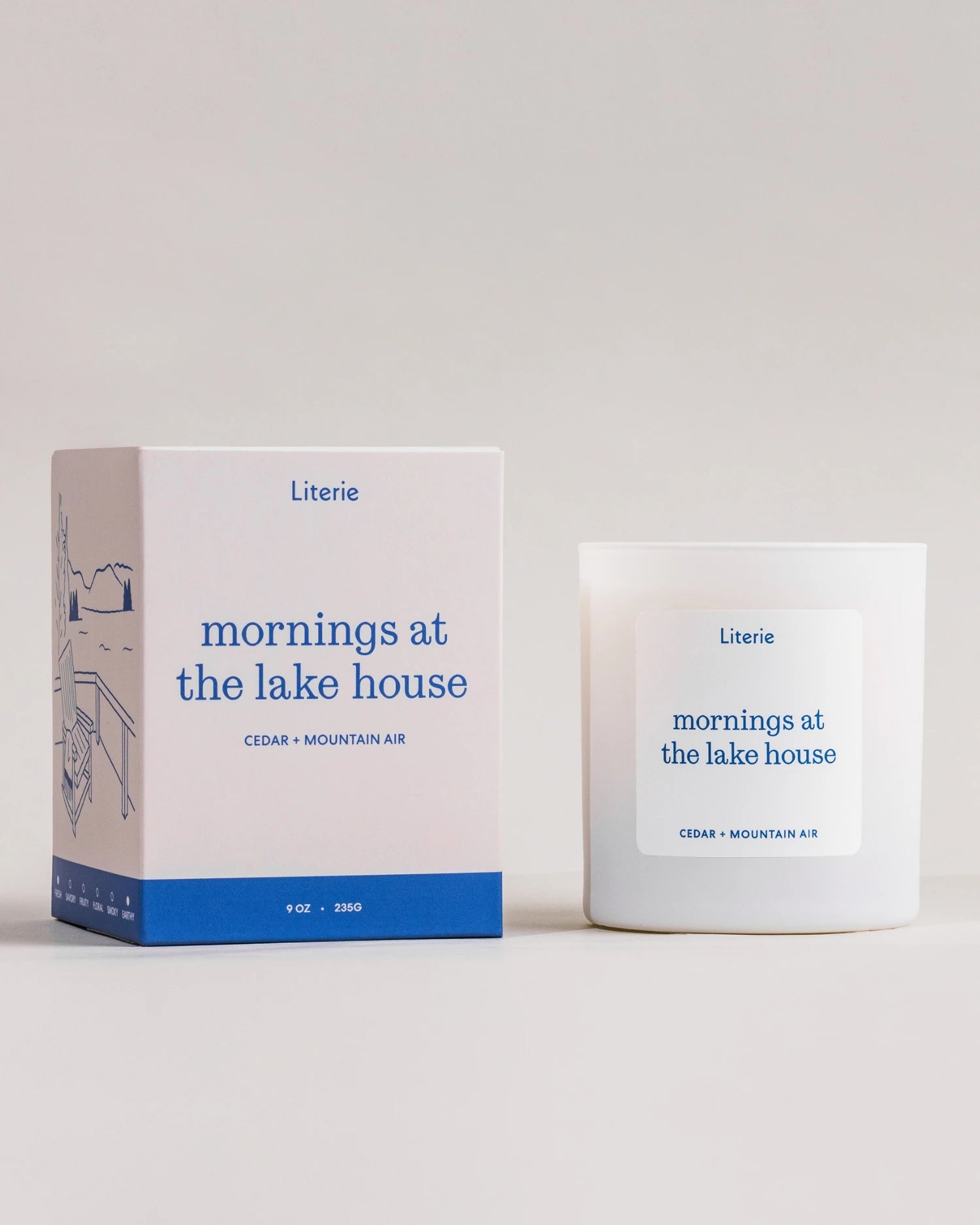 Literie candle and packaging with 'mornings at the lake house' text on a neutral background