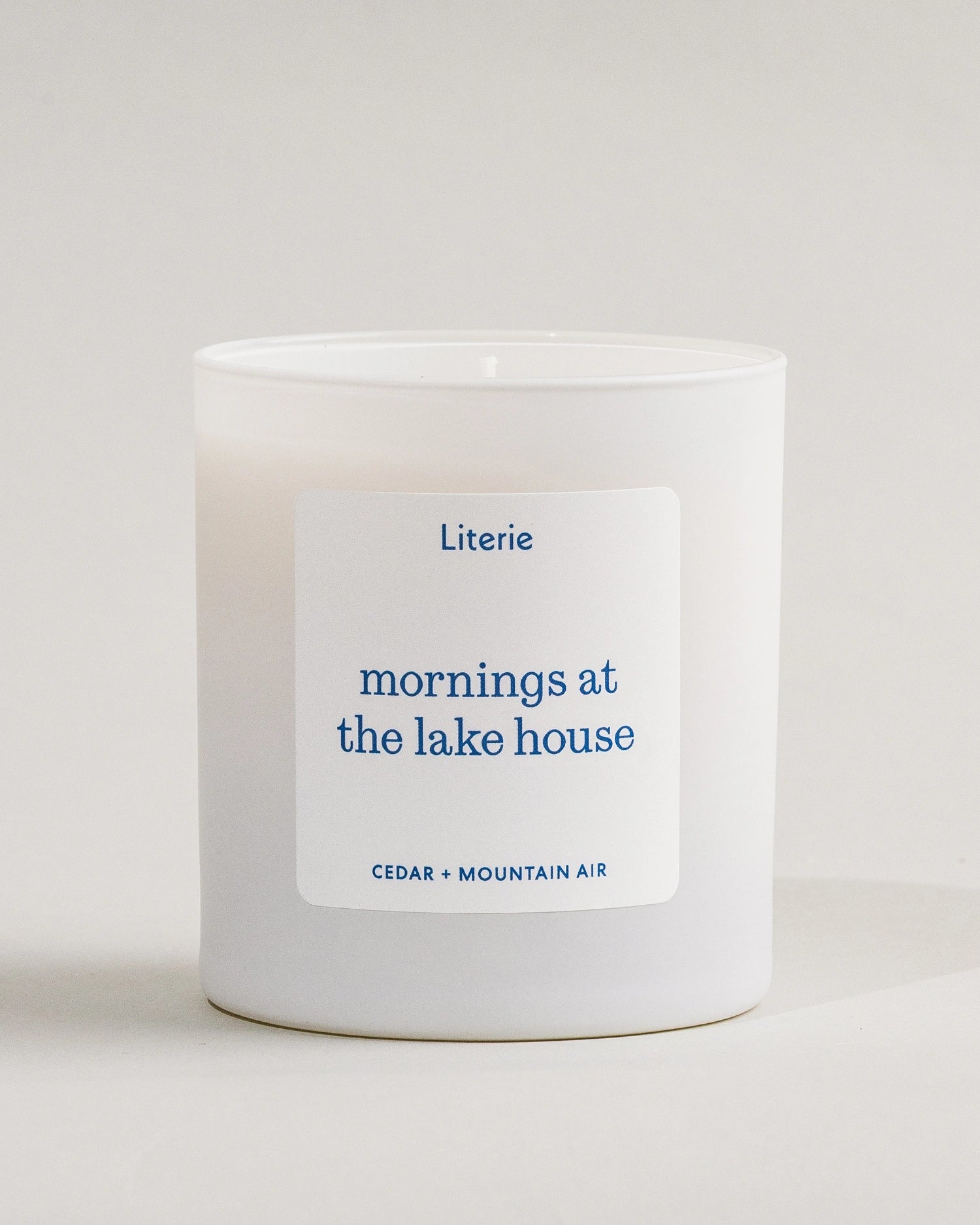 'mornings at the lake house' candle by Literie on a white background