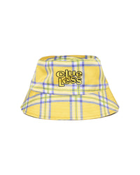 Yellow plaid bucket hat with 'clueless' text on a white background