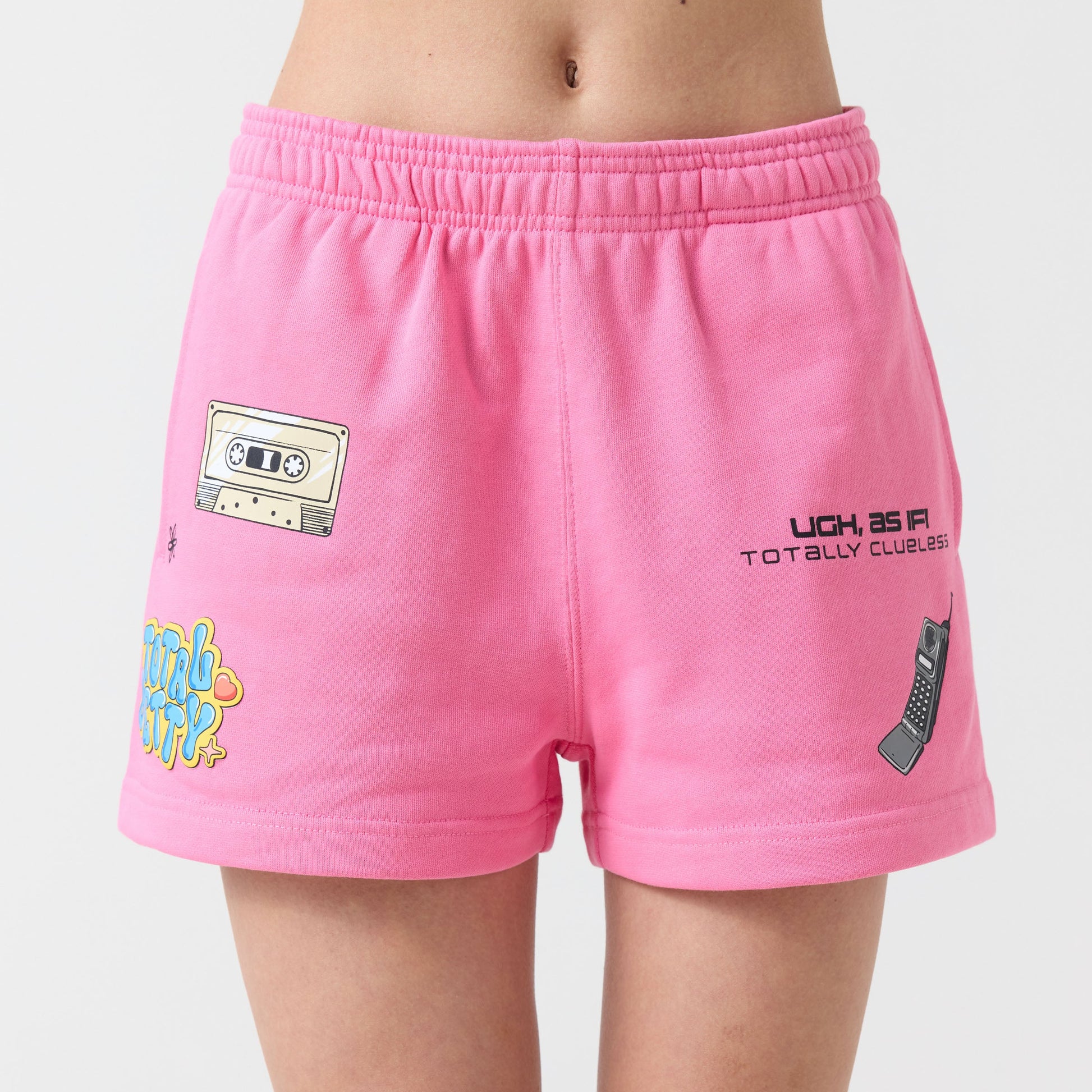 Pink shorts with various designs on a plain background
