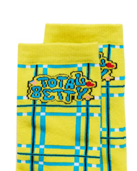 Yellow Cluless socks with plaid pattern and 'Total Betty' text on a white background