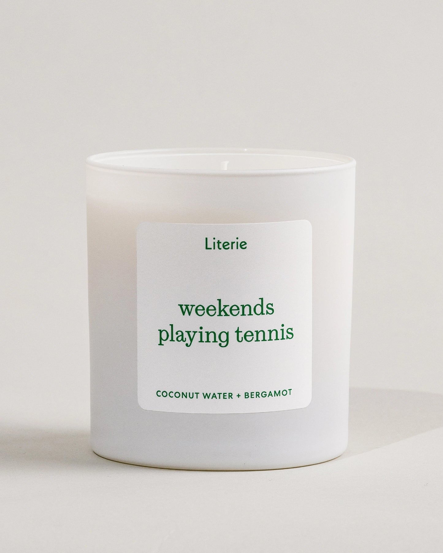 'weekends playing tennis' candle by Literie on a white background