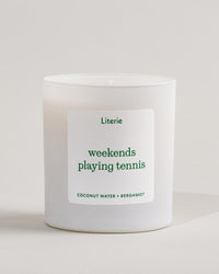 'weekends playing tennis' candle by Literie on a white background