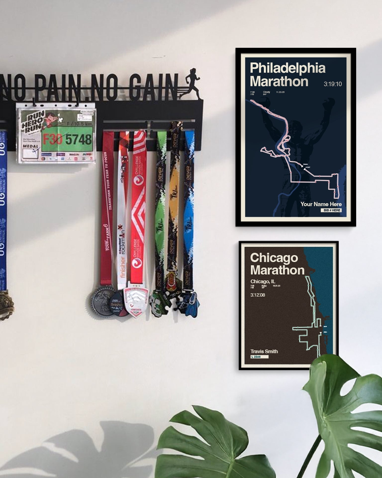 Wall with marathon-themed decor including framed posters and medals