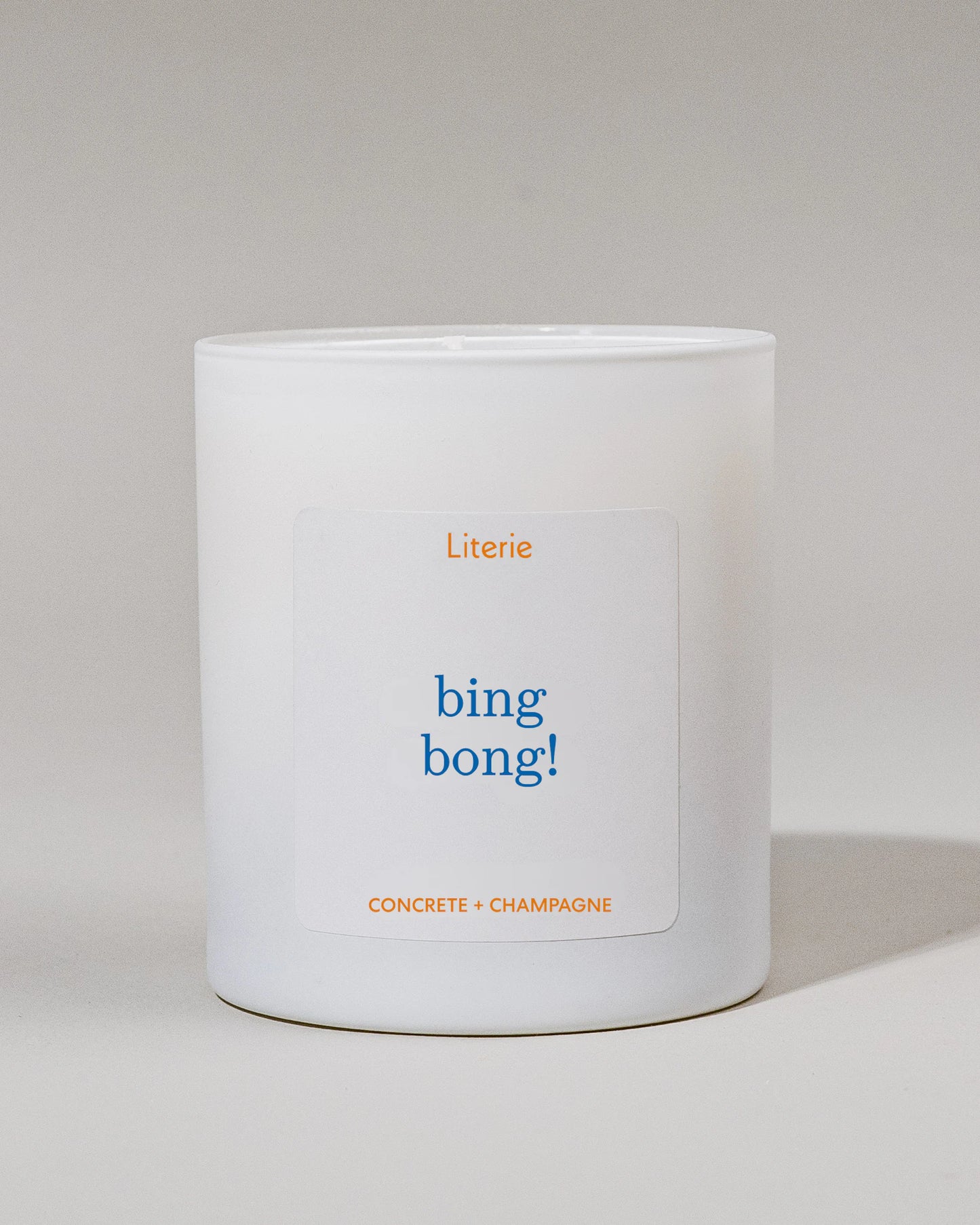 White Knicks inspired candle container with 'bing bong!' label on a light gray background