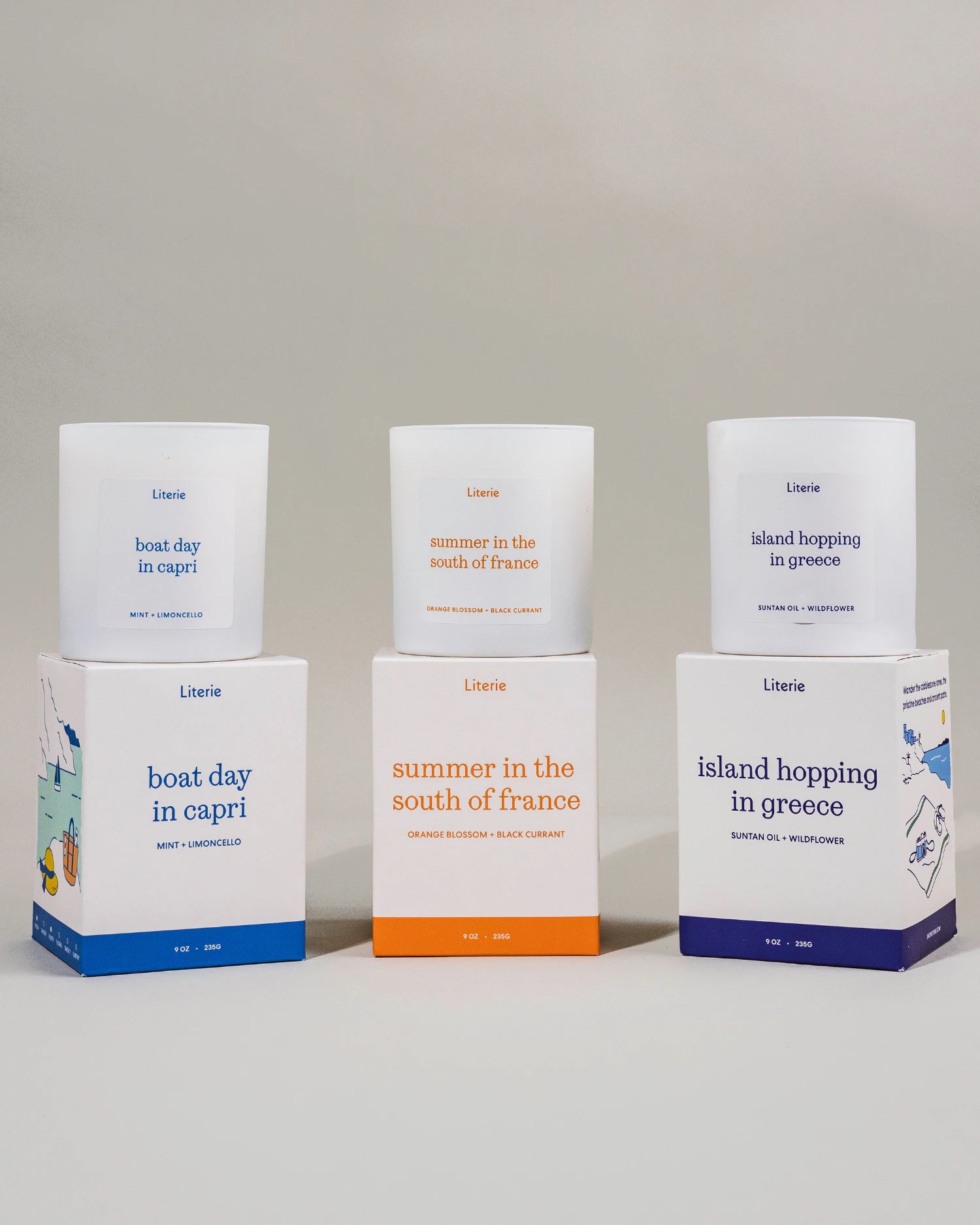 Euro summer collection of candles with boxes against a gray background