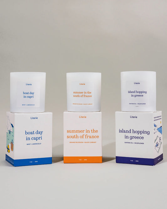 Euro summer collection of candles with boxes against a gray background