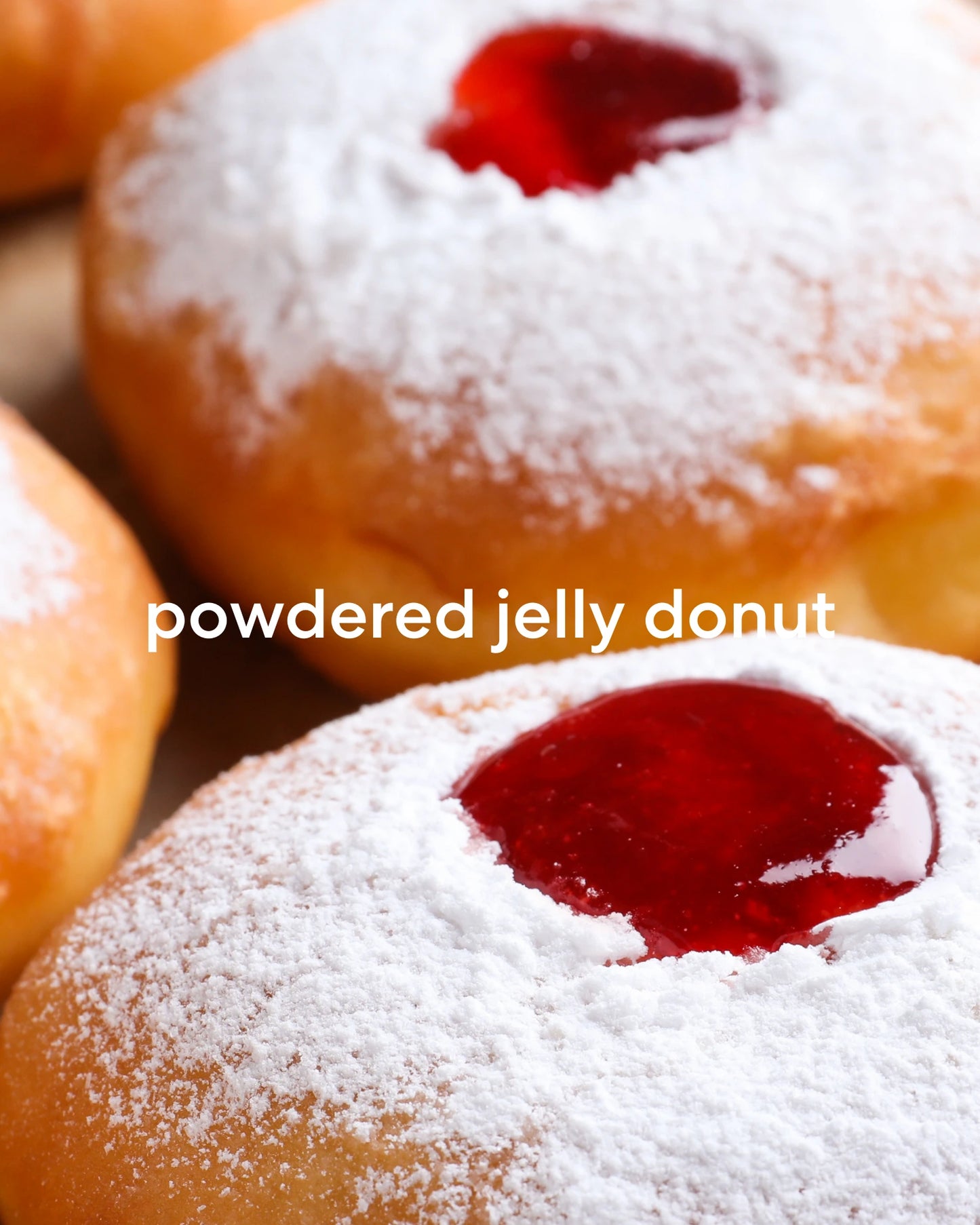 Sweet and fruity powdered jelly donuts.