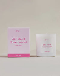 28th Street flower market candle box spinning 360° next to candle.