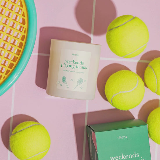 Weekends playing tennis candle with tennis balls moving.