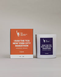 I Ran The TCS New York City Marathon official candle with box spinning to show illustrations.