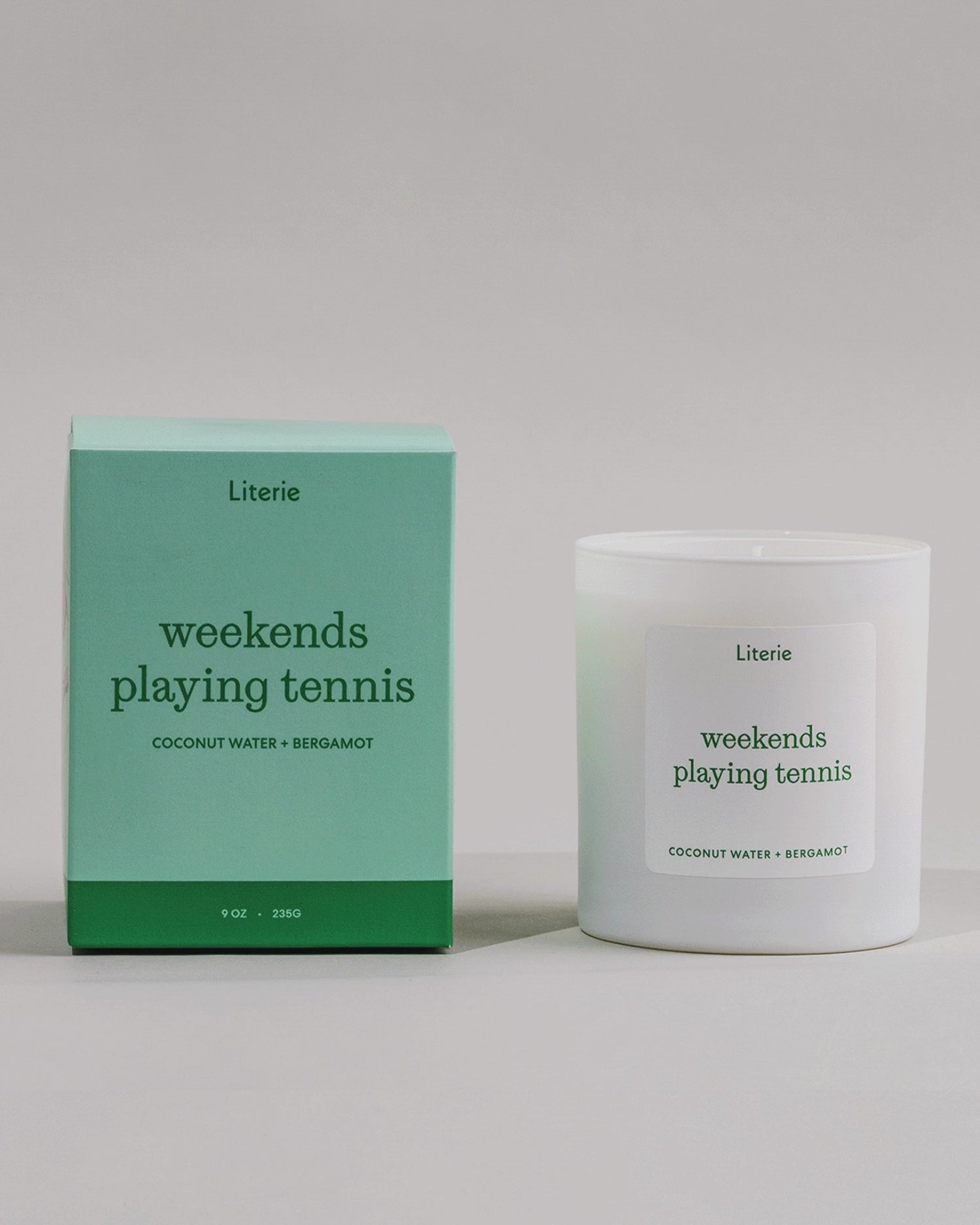 Weekends Playing Tennis candle box spinning next to the candle.