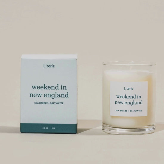 'weekend in new england' little candle box turning 360 next to the candle.