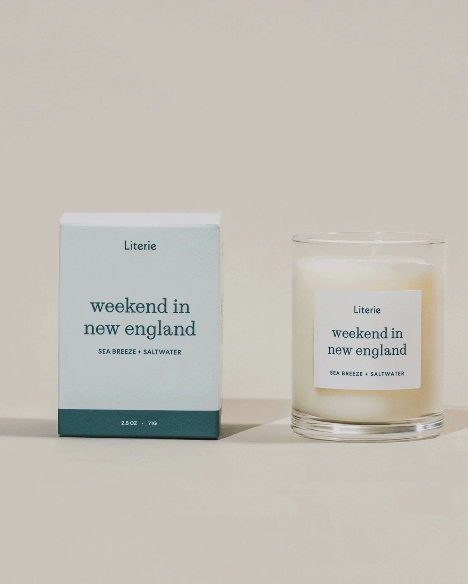 'weekend in new england' little candle box turning 360 next to the candle.