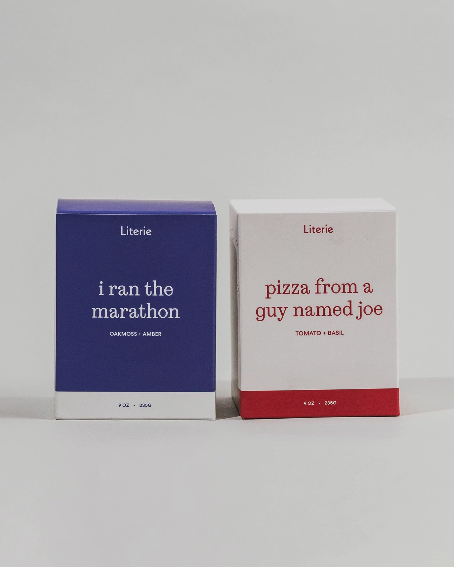 'i ran the marathon' and 'pizza from a guy named joe' candle duo boxes turning.