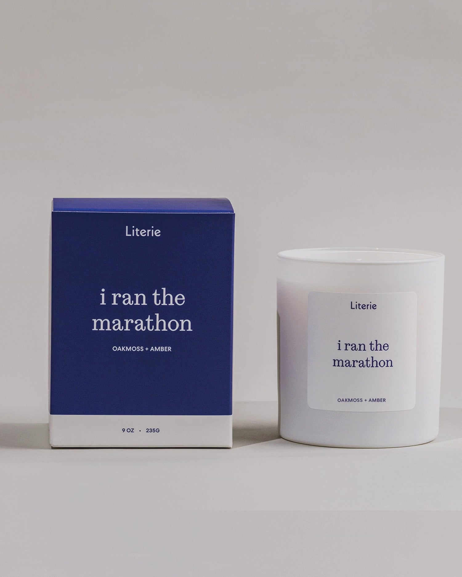 'i ran the marathon' candle box spinning with the candle still next to it.