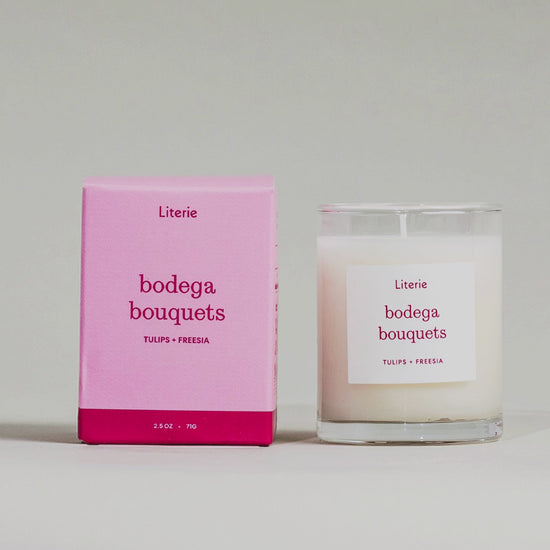 "Bodega Bouquets" little candle and box rotating to show illustrations on a grey background.
