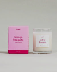 "Bodega Bouquets" little candle and box rotating to show illustrations on a grey background.