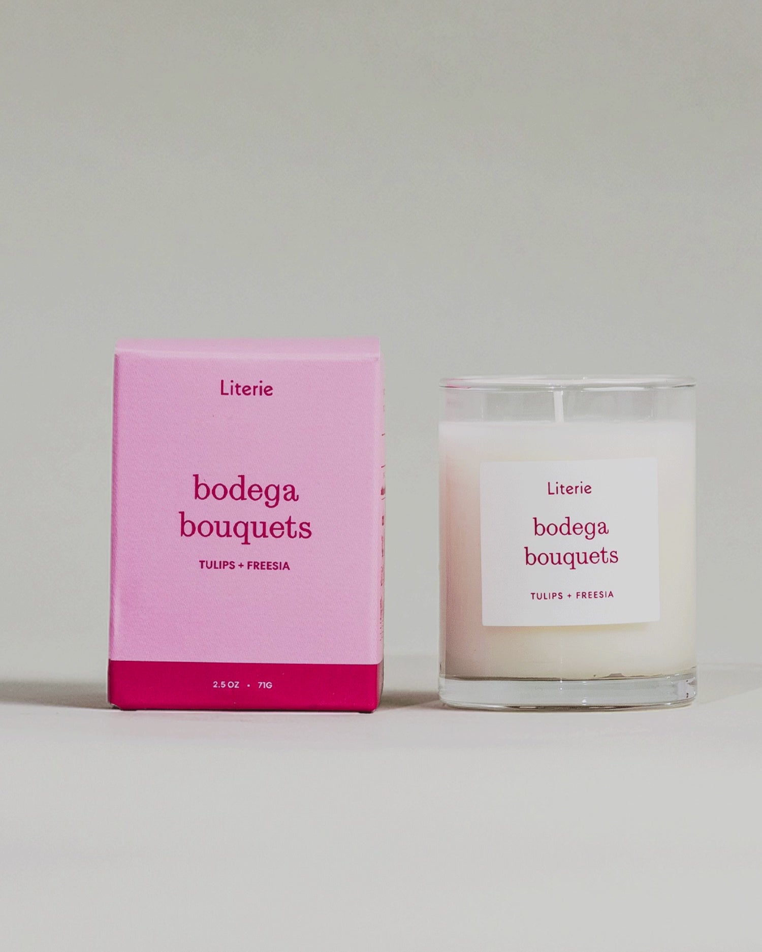 "Bodega Bouquets" little candle and box rotating to show illustrations on a grey background.